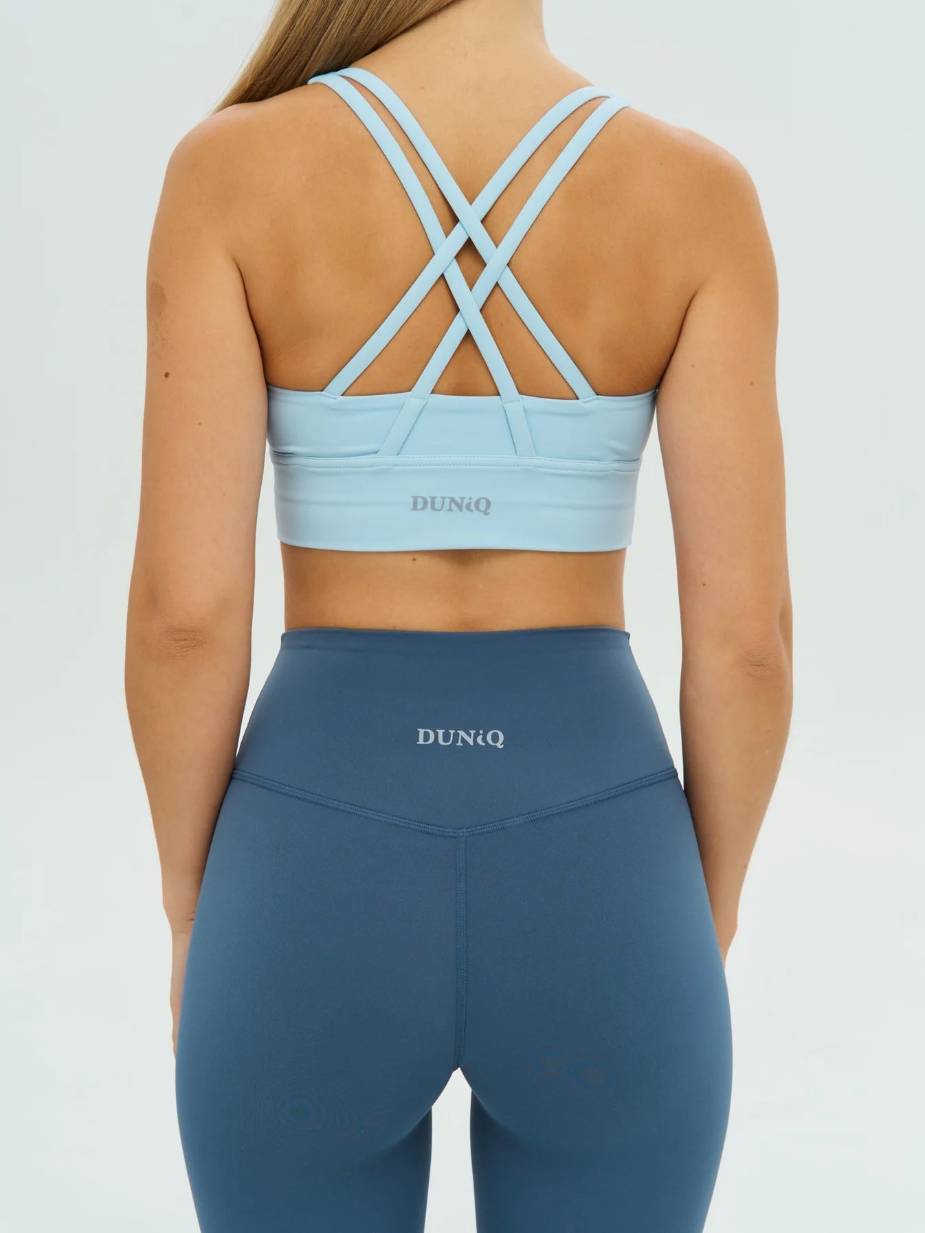 DUNIQ CROSS BACK SPORTS BRA - LIGHT BLUE - SQOON