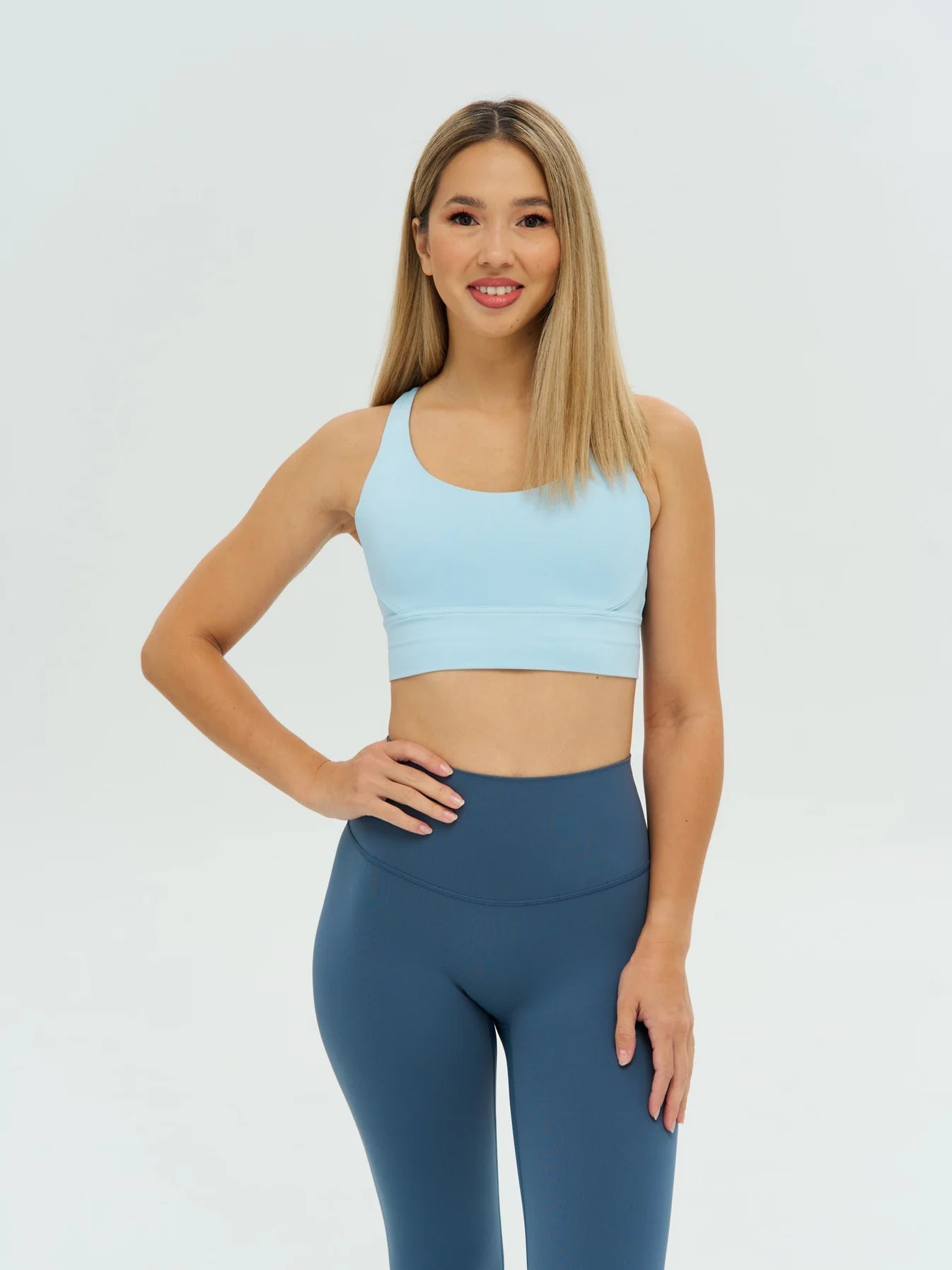 DUNIQ CROSS BACK SPORTS BRA - LIGHT BLUE - SQOON