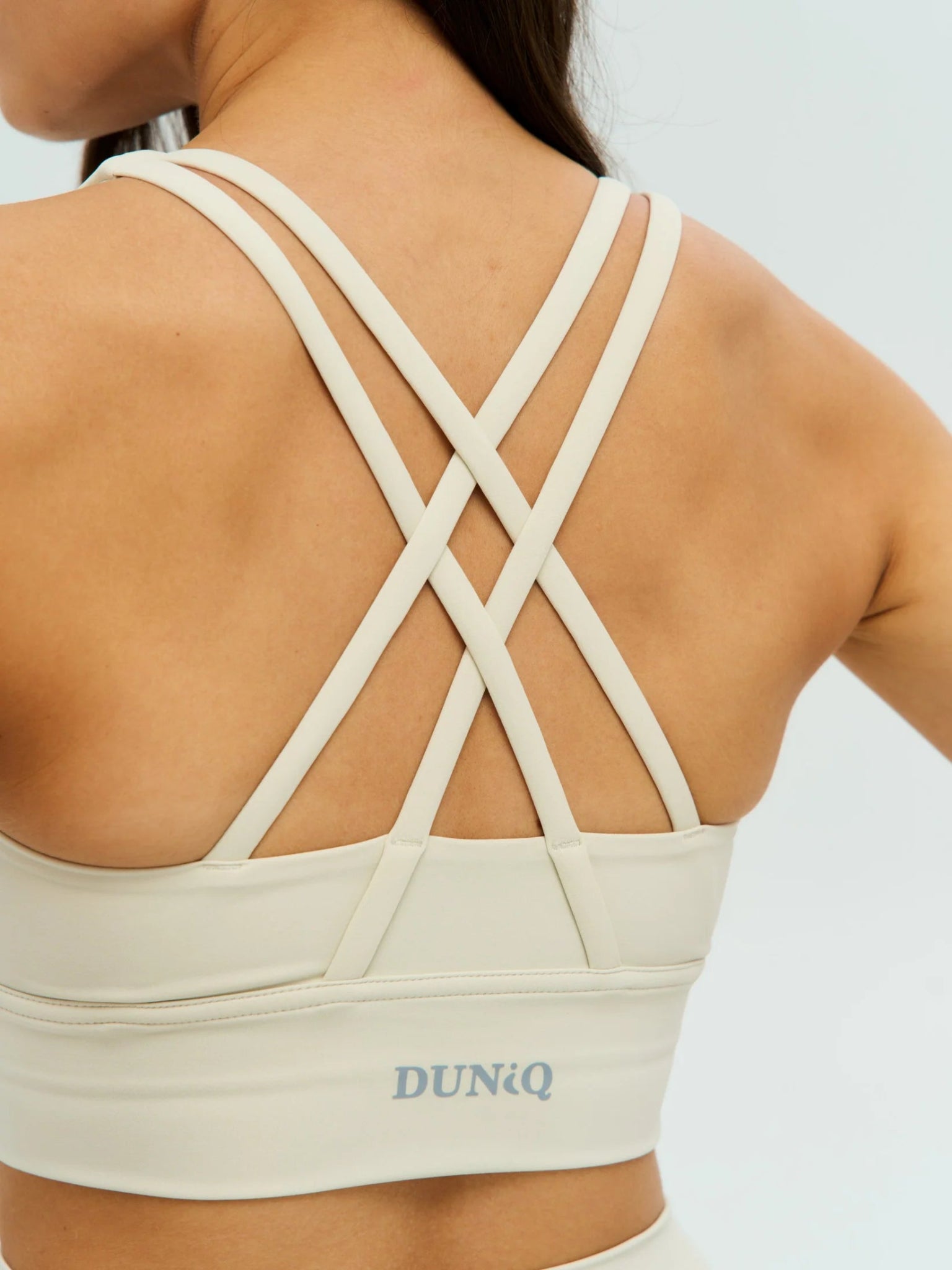 DUNIQ CROSS BACK SPORTS BRA - LIGHT IVORY - SQOON