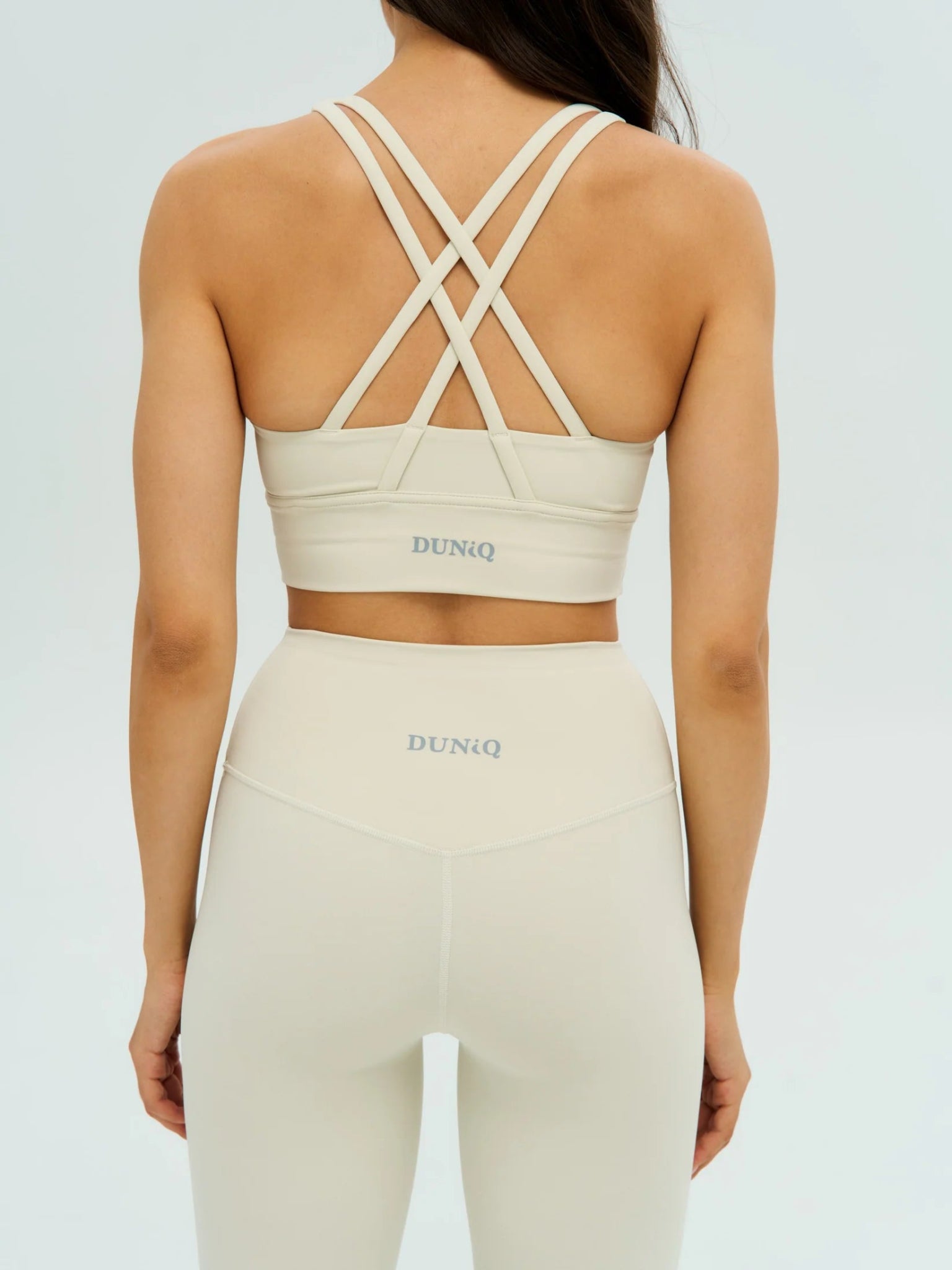 DUNIQ CROSS BACK SPORTS BRA - LIGHT IVORY - SQOON